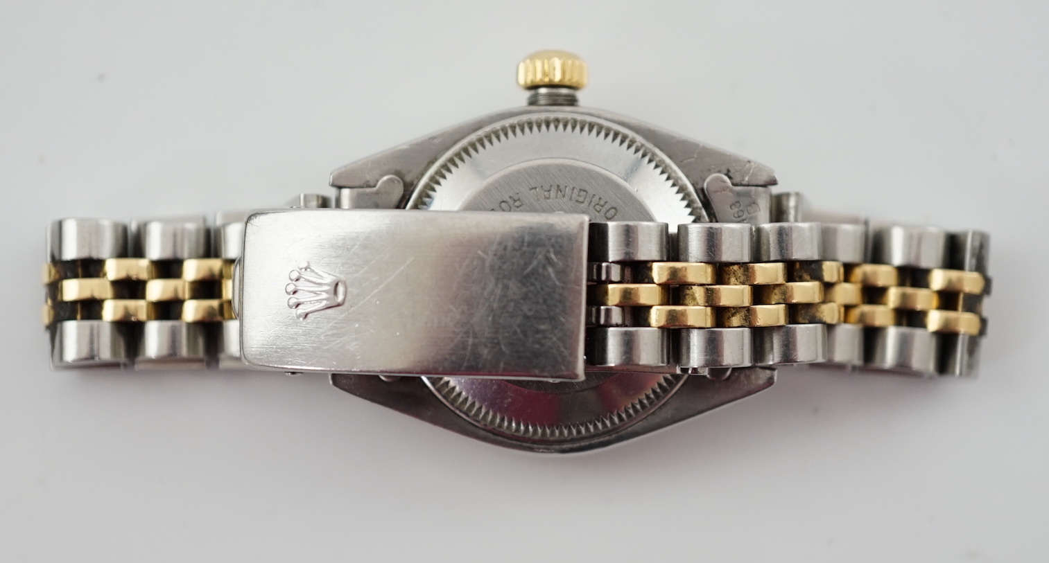 A lady's 1980's stainless steel and gold Rolex Oyster Perpetual Datejust wrist watch, with mother of pearl dial and diamond dot markers and bezel